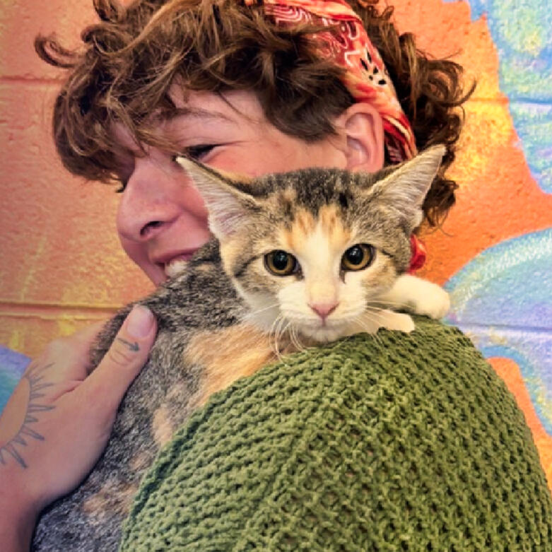 Ash, adopted February 2025 Whiskey the dog and new owner